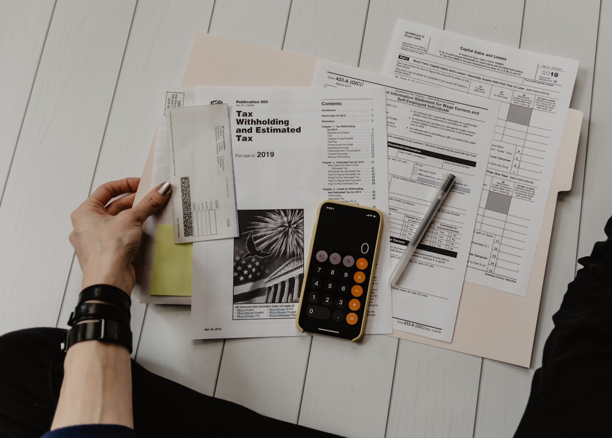 Reviewing a contract and figures on a desk